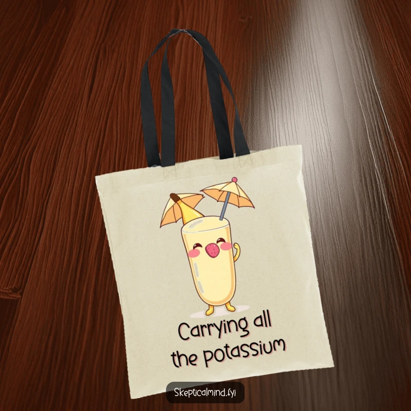 Funny Banana smoothie character blowing a raspberry on a tiny umbrella, printed on a sturdy tote bag.